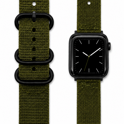 An olive green woven nylon watch strap with black metal hardware, shown both loose and attached to a black smartwatch on a plain white background.