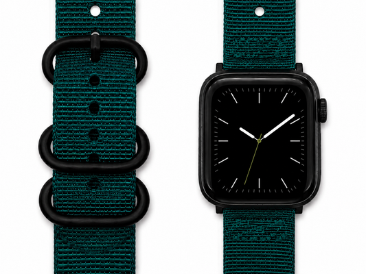 A dark teal woven nylon watch band with black metal hardware, shown both as a standalone strap and attached to a black smartwatch on a clean white background.